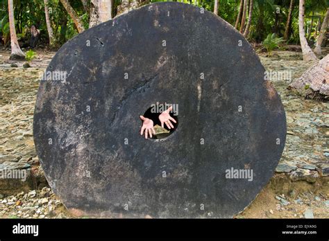 Stone money from micronesia hi-res stock photography and images - Alamy