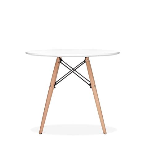 a white table with two wooden legs and a round dining table in the middle, against a white ...