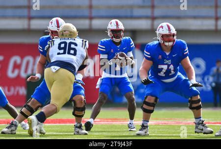 Southern Methodist Mustangs quarterback Kevin Jennings drops back to ...