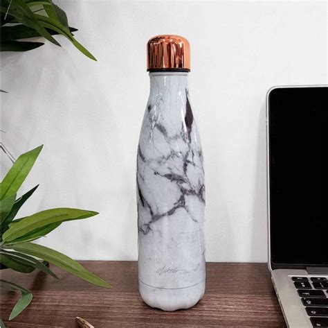 Introducing our stainless steel marble water bottle with our signature ...