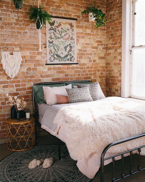 Jane on Instagram: "Bringing boho home. ️ ⠀ (Tap to shop the photo.) 💕" | Brick wall bedroom ...