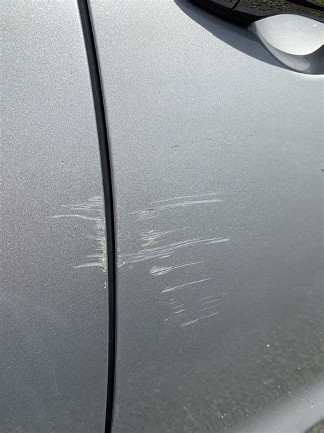 Just scratched my car. How much does something like this cost to repair ...