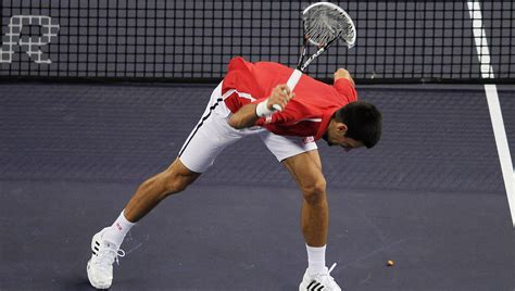 Novak Djokovic takes frustration out on his racket