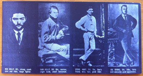 an old photo of men in suits and ties on a wooden table with blue ...