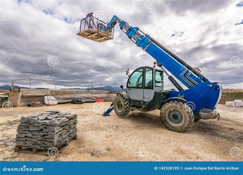 Forklift On A Construction Site, Preparing To Raise Construction Parts ...