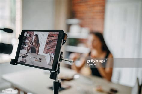 Young Woman Making Makeup Tutorial High-Res Stock Photo - Getty Images