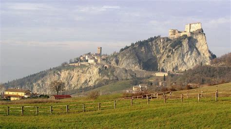 San Leo, Italy. This village built on a plateau is protected by sheer ...