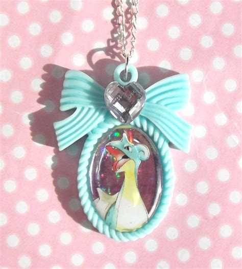 Lapras shiny Pokemon card bow cameo necklace by KawaiiMoon24 on DeviantArt