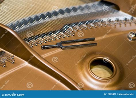 Tuning fork on a piano stock image. Image of metal, equipment - 12973407