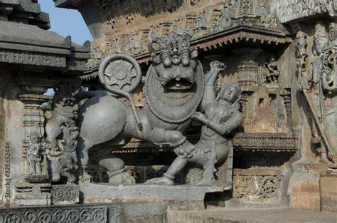 Carved sculptures on the outer wall of the Chennakeshava Temple complex ...