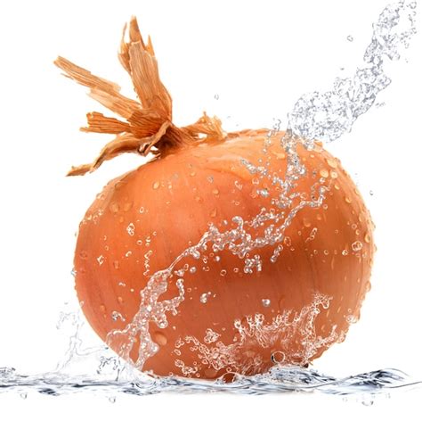 Premium Photo | Fresh onion falling in water