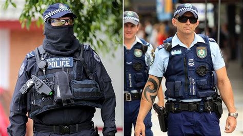 AFP Police officers forced to hide tattoos under new uniform rules | Daily Telegraph