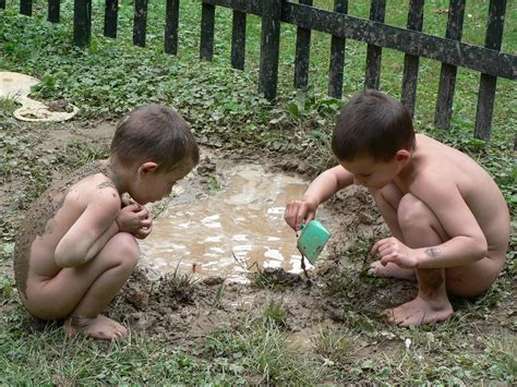 Playing with mud 1 Free Photo Download | FreeImages