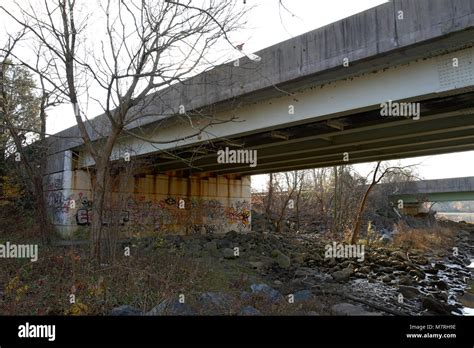 Graffiti under a overpass Stock Photo - Alamy