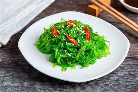 Premium Photo | Fresh seaweed salad, healthy vegetarian food.