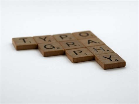 brown wooden blocks on white surface - online puzzle