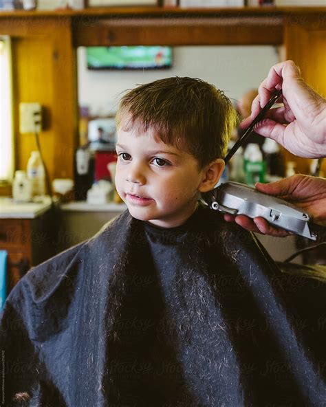 View "Handsome Young Boy Getting His Haircut In A Barbershop" by Stocksy Contributor "Cameron ...