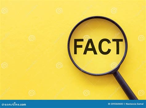 Fact - Word through Magnifying Glass on Yellow Table Stock Photo - Image of fiction, news: 209360600