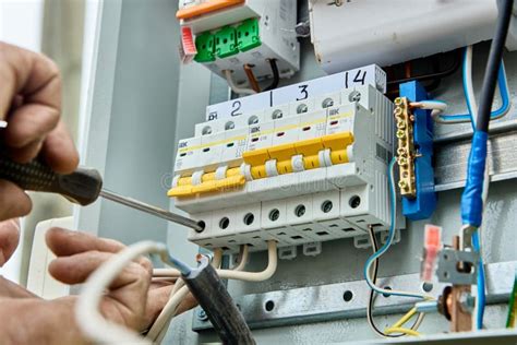 Connecting Wires To Circuit Breaker Fuse Box in Consumer Unit of Distribution Panel. Stock Image ...