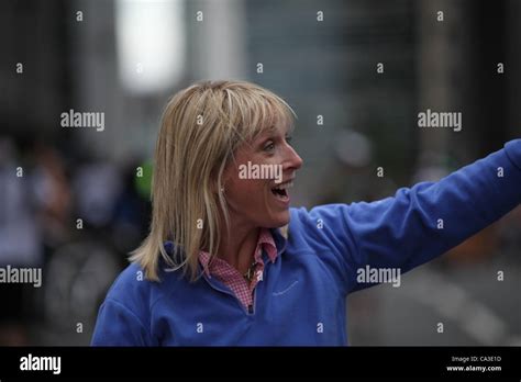 Jill Douglas waves to fans as she walks to the start of the race - Stage 7 of Halfords Tour ...