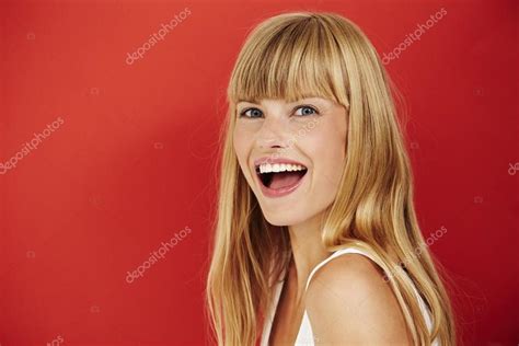 Young woman laughing Stock Photo by ©sanneberg 83700618