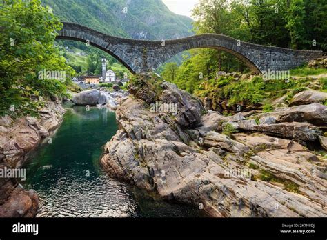 Romantic Ponte dei Salti bridge in Lavertezzo, Verzasca valley in swiss Alps mountains ...