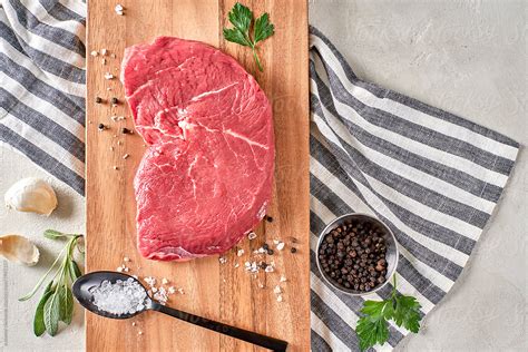 "Raw Grass Fed Strip Steak Meal Preparation" by Stocksy Contributor ...