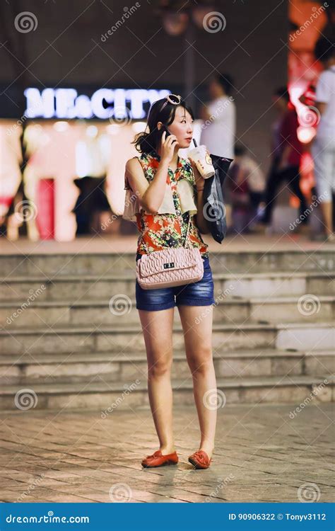 Fashionable Young Girl Making a Phone Call, Kunming, China Editorial Photography - Image of ...