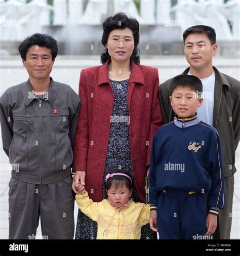 North Korean family posing in the street, Pyongan Province, Pyongyang ...