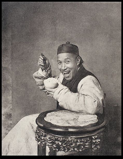A smiling man eating rice in a photographer's studio | Historical Photographs of China ...
