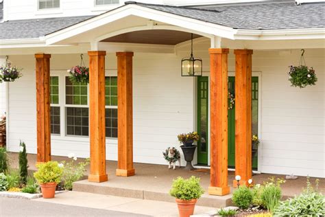 Adding Cedar Pillars to our Dream House | Front porch columns, Porch ...