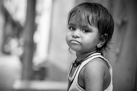 Child on Steel Framed Stool · Free Stock Photo