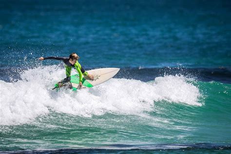 Surfing Trigg Beach, WA