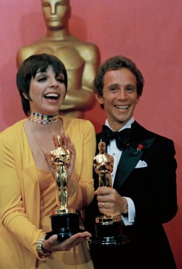 Liza Minnelli, holds her Oscar for "Actress in a Leading Role," as she ...