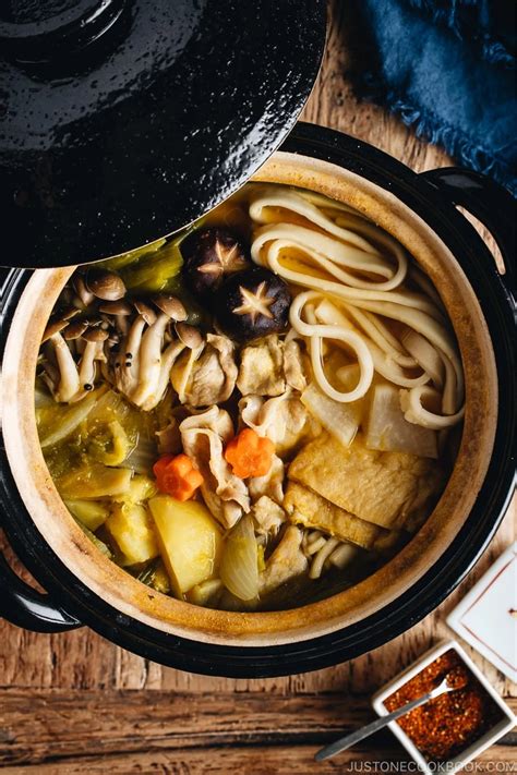 Filled with mushrooms, root vegetables, meat, and flat noodles in miso ...