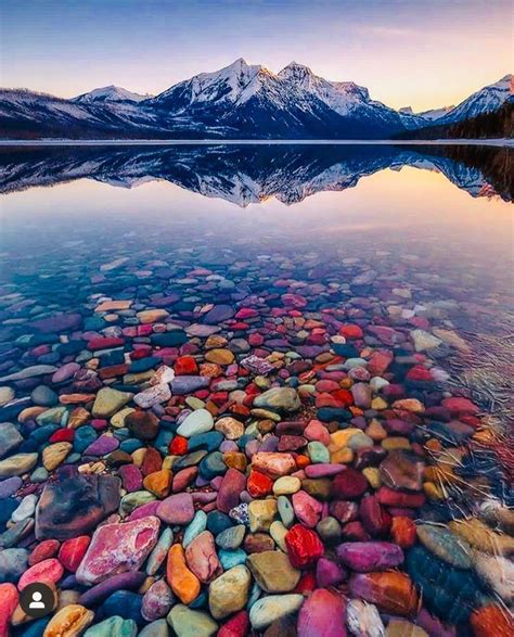 The colorful pebbles of Lake McDonald in Glacier National Park ...