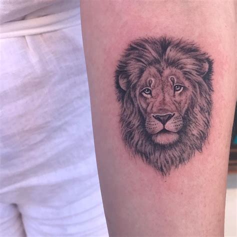 Lion tattoo on upper forearm. Done by Paul at Unique Tattoos in Perth ...