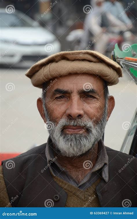 Portrait Of Pathan Police Officer In Grey Sweater And Police Hat ...