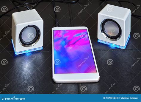 Mini Speakers are Connected by Cable To Smartphone Stock Photo - Image ...