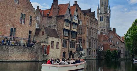 Bruges: Boat Cruise and Guided Walking Tour | GetYourGuide