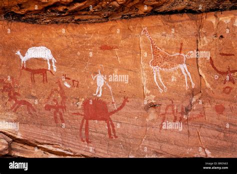 Painted figures and animals, rock art in the Akakus Mountains, Sahara ...