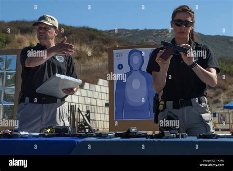 Alcohol, Tobacco, and Firearms (ATF) Special Agents demonstrate how to ...