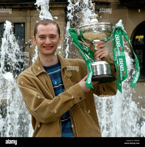 World Snooker champion Graeme Dott poses for photographers with the ...