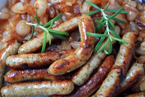 Fried sausage and onions stock image. Image of nurenberger - 10368471