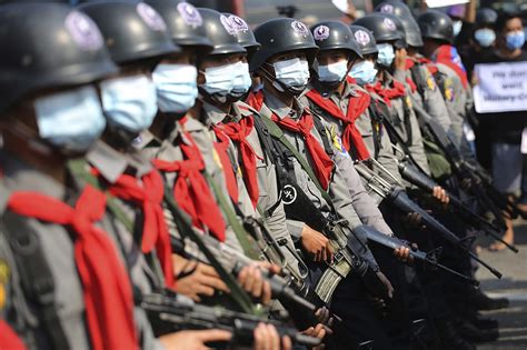 Burma bans protests as resistance swells