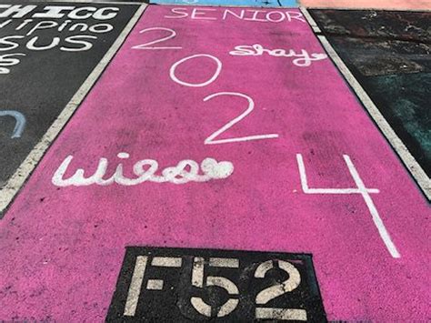 PHOTOS: Hamilton High School seniors painted their parking lot spaces, 2023-2024