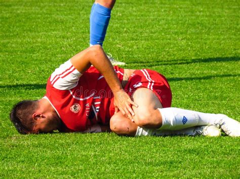 Injured Football Player on the Pitch Editorial Stock Photo - Image of adidas, injured: 161773833