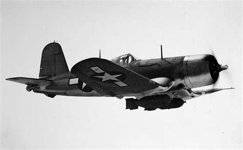 Asisbiz Vought F4U-1D Corsair carring two 1000 pound bombs and in the three tone paint scheme 01