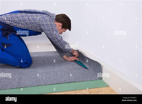 Carpet fitting hi-res stock photography and images - Alamy