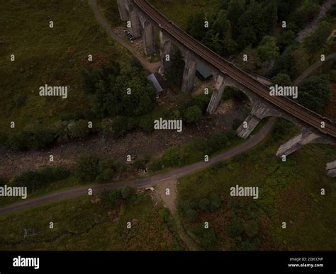 Aerial View Of Train On Bridge Over Landscape Stock Photo - Alamy